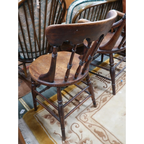 45 - A 19th century beech framed rail back open armchair with shaped seat on turned stretchered supports ... 