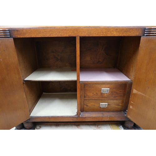 47 - A 20th century mahogany two door sideboard with single doors to sides, 100cm high x 121cm wide x 49c... 