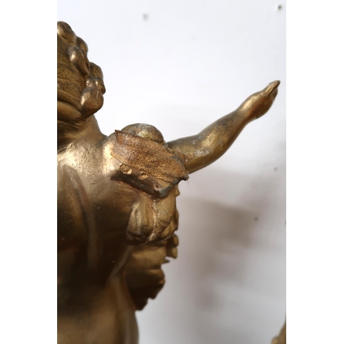50 - A pair of 20th century gilt gesso scrolled ogee wall mounts capped with figural cherubs, 78cm high (... 
