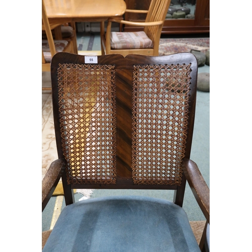 55 - A 20th century mahogany framed high bergere backed armchair, another bergere armchair and mahogany d... 