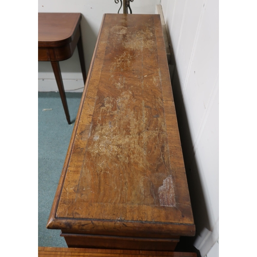 6 - An early 20th century mahogany and walnut veneered open bookcase on bracket feet, 91cm high x 123cm ... 