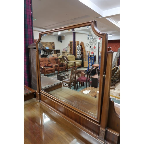 63 - An Edwardian mahogany mirror backed dressing chest with two over two drawers, 162cm high x 107cm wid... 