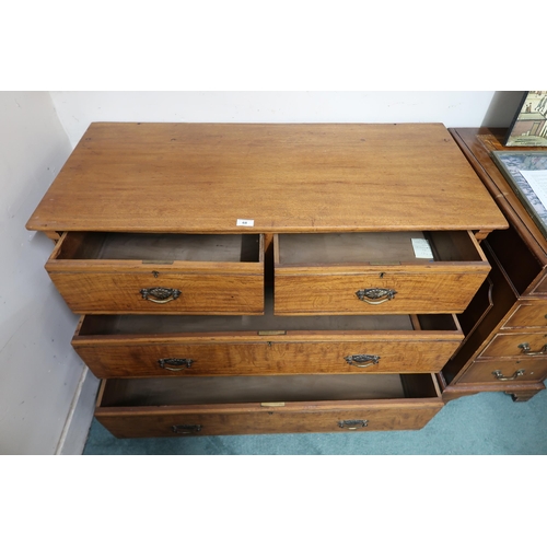 68 - A 20th century oak two over two chest of drawers, 78cm high x 102cm wide x 50cm deep