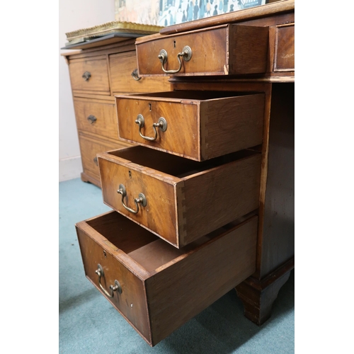 70 - A 20th century mahogany twin pedestal writing desk with leather skiver over single central drawer fl... 