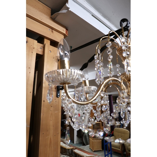 72 - A contemporary Italian gold plated five branch chandelier with cut glass sconces and drop decoration... 