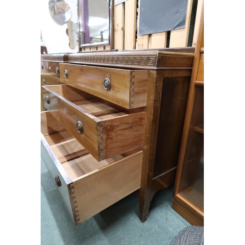 77 - A 20th century mahogany three drawer mirror backed dressing chest, 143cm high x 100cm wide x 51cm de... 