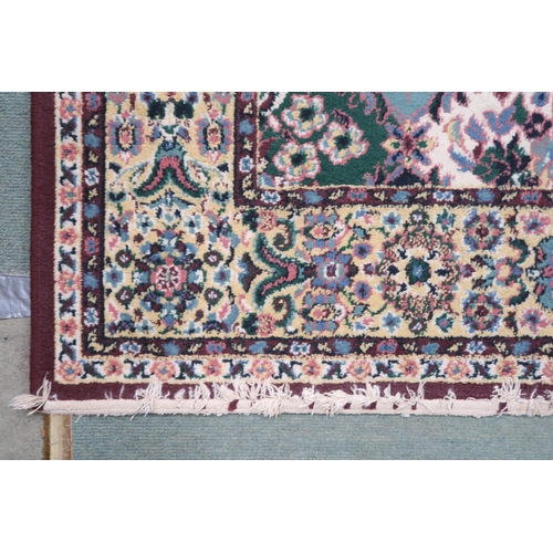 93 - A multicoloured ground floral pattern rug with multicoloured border, 230cm long x 160cm wide