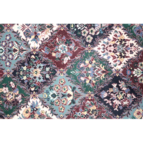 93 - A multicoloured ground floral pattern rug with multicoloured border, 230cm long x 160cm wide