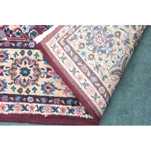 93 - A multicoloured ground floral pattern rug with multicoloured border, 230cm long x 160cm wide