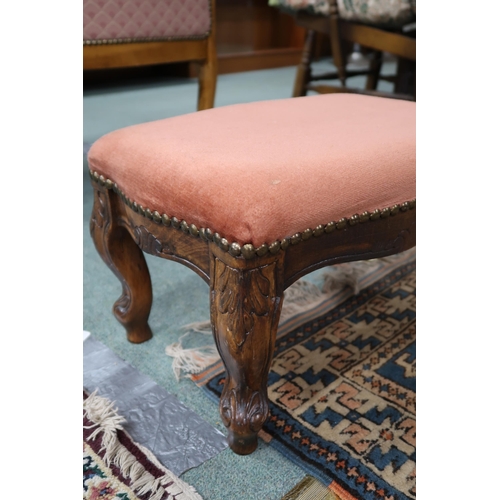 95 - A 20th century buttonback upholstered armchair and an upholstered footstool (2)