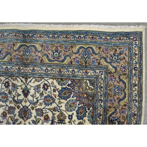 2134 - A CREAM GROUND MESHED RUGwith multicolour flower head central medallion, matching spandrels and flow... 