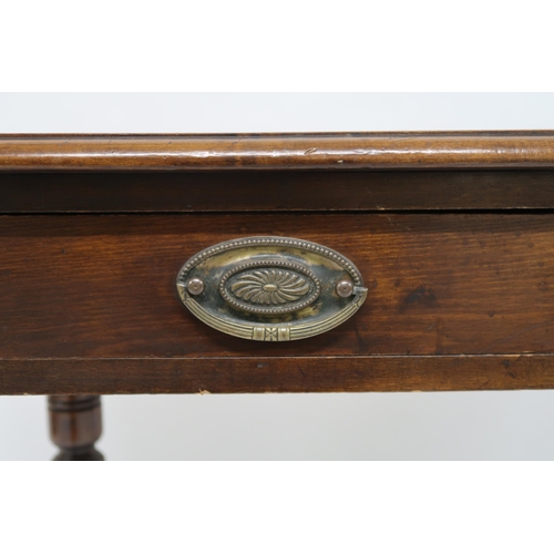 14 - A Victorian mahogany two drawer writing desk with embossed skiver on turned supports, 76cm high x 10... 