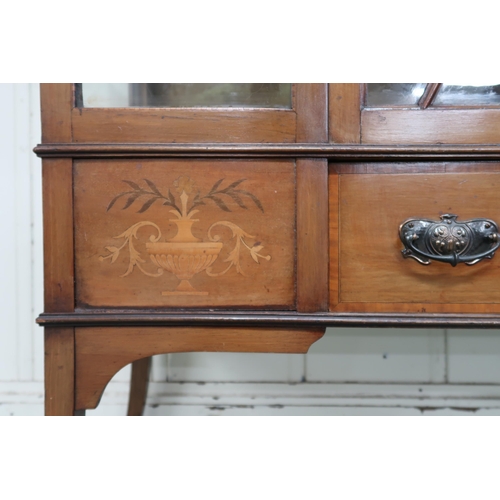 15 - A late Victorian mahogany and satinwood inlaid display cabinet with single central glazed door flank... 