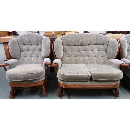 34 - A 20th century beech framed Ercol style four piece suite comprising two two seater sofas, 102cm high... 