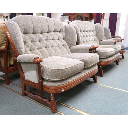 34 - A 20th century beech framed Ercol style four piece suite comprising two two seater sofas, 102cm high... 