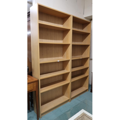 42 - A pair of contemporary five shelf open bookcases, 202cm high x 80cm wide x 28cm deep (2)