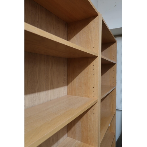 42 - A pair of contemporary five shelf open bookcases, 202cm high x 80cm wide x 28cm deep (2)