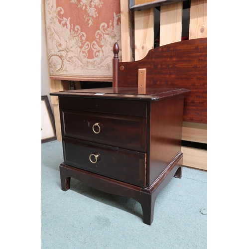 46 - A mid 20th century Stag two drawer bedside cabinet and two Stag head boards (3)