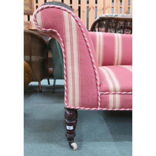 58 - A Victorian scroll armed settee on turned supports terminating in ceramic casters, 76cm high x 183cm... 