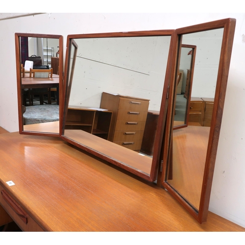 63 - A mid 20th century teak G Plan Fresco dressing mirror with three mirrors over single central drawer ... 