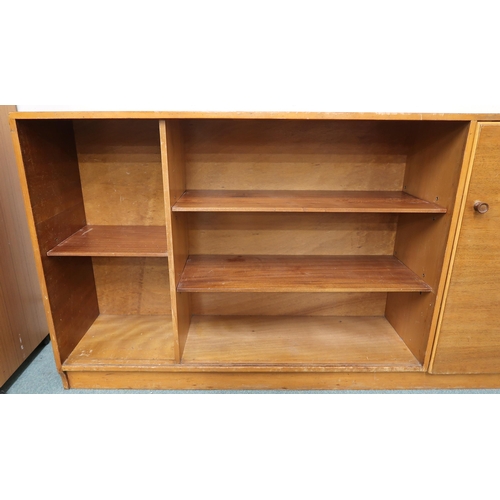 65 - A mid 20th century teak bookcase with cabinet door and accompanying corner cabinet, 76cm high x 192c... 