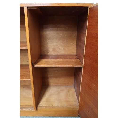 65 - A mid 20th century teak bookcase with cabinet door and accompanying corner cabinet, 76cm high x 192c... 