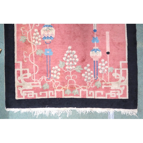 8 - A lot to contain pink ground Oriental style rug with scenic pattern and black border, 213cm long x 1... 