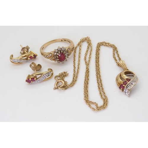 598 - A 9ct gold ruby and diamond pendant on chain and matching earrings together with a similar ring set ... 