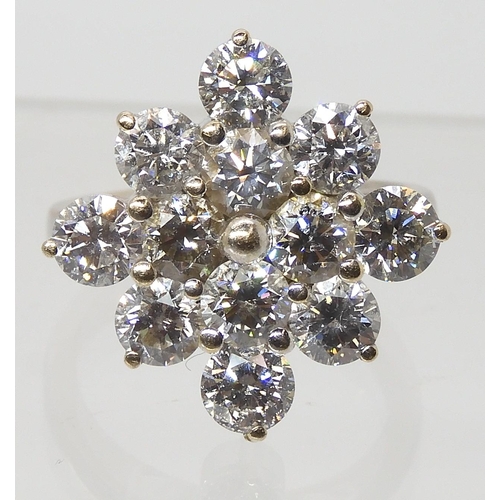 2788 - A SUBSTANTIAL DIAMOND CLUSTER RINGset with estimated approx 3.60cts of brilliant cut diamonds, mount... 