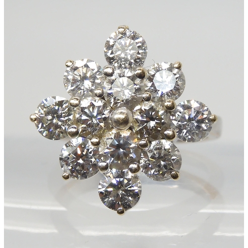 2788 - A SUBSTANTIAL DIAMOND CLUSTER RINGset with estimated approx 3.60cts of brilliant cut diamonds, mount... 