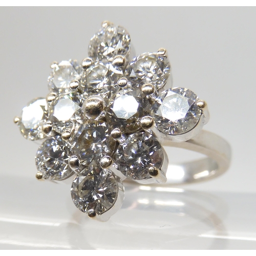 2788 - A SUBSTANTIAL DIAMOND CLUSTER RINGset with estimated approx 3.60cts of brilliant cut diamonds, mount... 