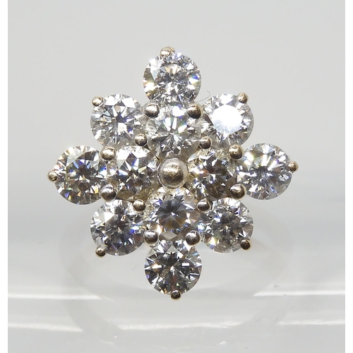 2788 - A SUBSTANTIAL DIAMOND CLUSTER RINGset with estimated approx 3.60cts of brilliant cut diamonds, mount... 