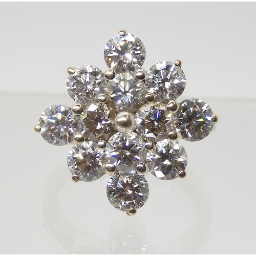 2788 - A SUBSTANTIAL DIAMOND CLUSTER RINGset with estimated approx 3.60cts of brilliant cut diamonds, mount... 