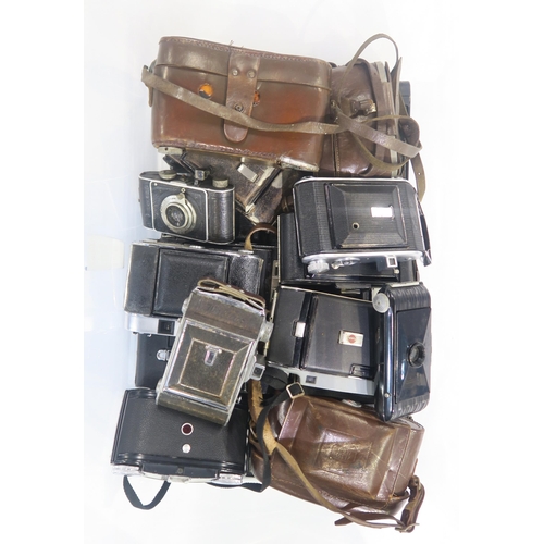 442 - An assortment of folding cameras, many being Kodak (including a 