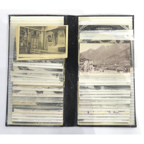 446 - Three albums of early-20th century tourist postcards, with many French views (particularly Versaille... 