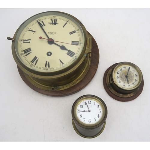 450 - A Smiths Astral brass bulkhead clock, two miniature examples and various wristwatches with manufactu... 