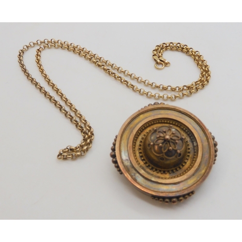 502 - A yellow metal Etruscan revival locket back brooch (pin lacking) and a 9ct gold belcher chain, lengt... 