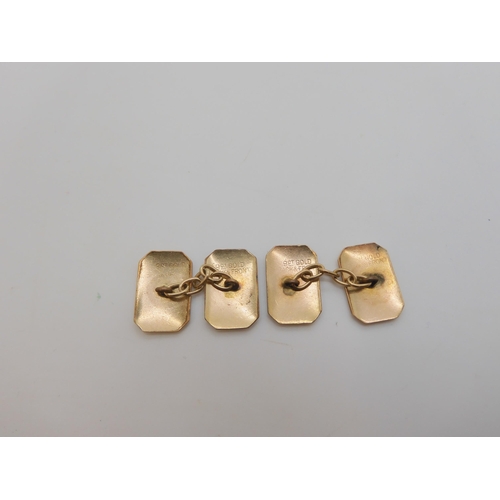 503 - A pair of 9ct gold Mackintosh style cufflinks together with a back & front Deco pattern monogram... 