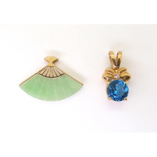 509 - A 9ct gold Chinese green hardstone fan pendant, together with a blue and clear gem set pendant, weig... 