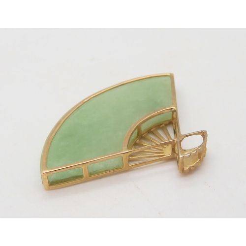 509 - A 9ct gold Chinese green hardstone fan pendant, together with a blue and clear gem set pendant, weig... 