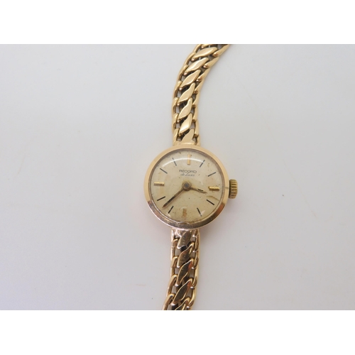 520 - A 9ct gold ladies Record De Luxe watch, with integral chain link strap, length 16.5cm, weight includ... 