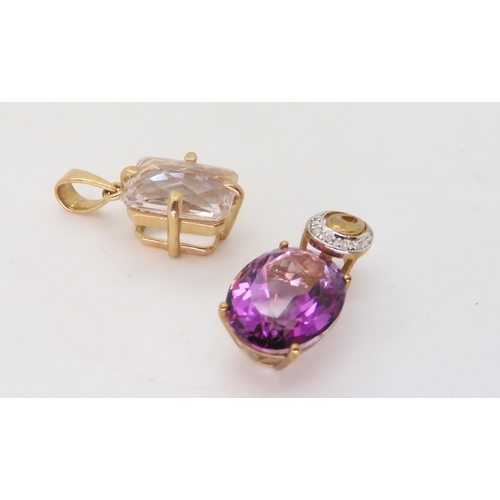 523 - A 9ct gold manufactured purple gem and diamond pendant, together with a 9ct pale pink gem set pendan... 