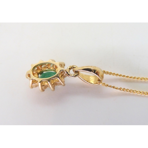 530 - A 9ct emerald and diamond pendant with similar earrings, weight together 3.2gmsTo be sold on behalf ... 