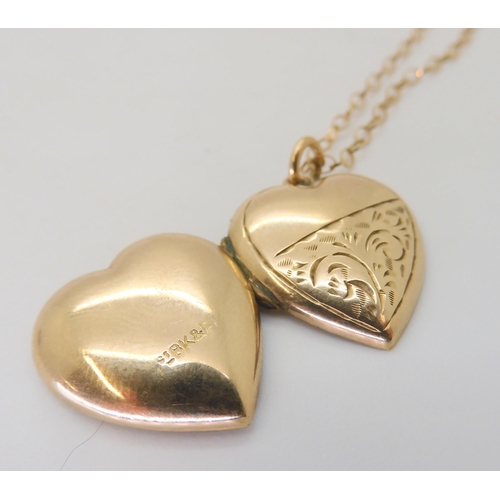 532 - A 9ct gold back & front locket with a 9ct chain, together with two further chains and a mother o... 