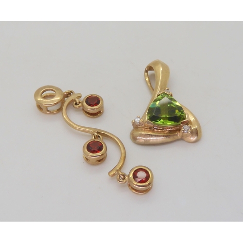 536 - A 9ct gold peridot and diamond pendant, together with a red gem set pendant , weight together 5.4gms