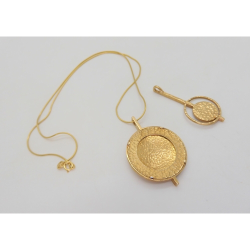 537 - Two 9ct gold Malcolm Gray for Ortak pendants, large, diameter 2.9cm, with rope chain, length 40cm, w... 