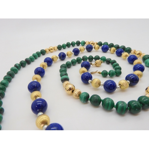 578 - A string of large lapis lazuli beads, pearls and 18ct gold beads, each lapis bead approx 12.5mm, len... 