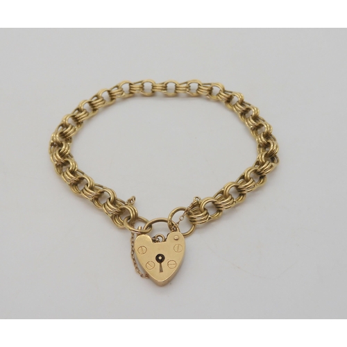 582 - A 9ct gold fancy link bracelet with heart shaped clasp, length 16.5cm, weight 11.6gms