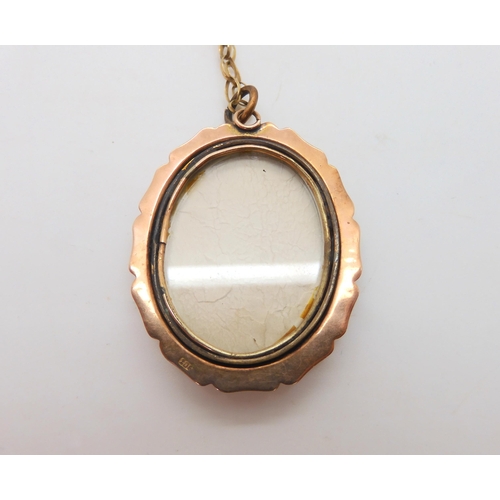 584 - A collection of 9ct gold and yellow metal items to include a miniature locket pendant painted with a... 