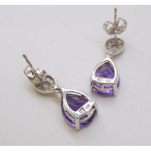 590 - A pair of 9ct white gold amethyst and diamond earrings, weight 2.9gmsTo be sold on behalf of Chest H... 